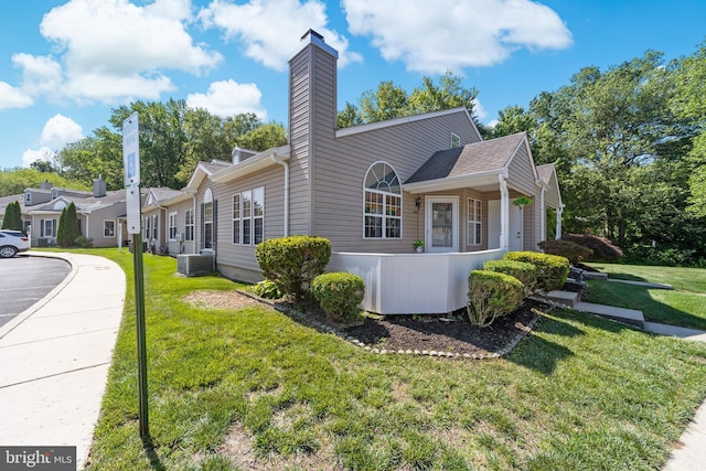 1401 Kenny, Burlington, NJ 08016 - view of home's exterior with a chimney and a lawn