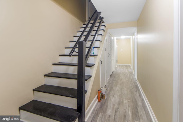 659 Charraway Rd, Baltimore, MD 21229 - stairs with wood finished floors and baseboards
