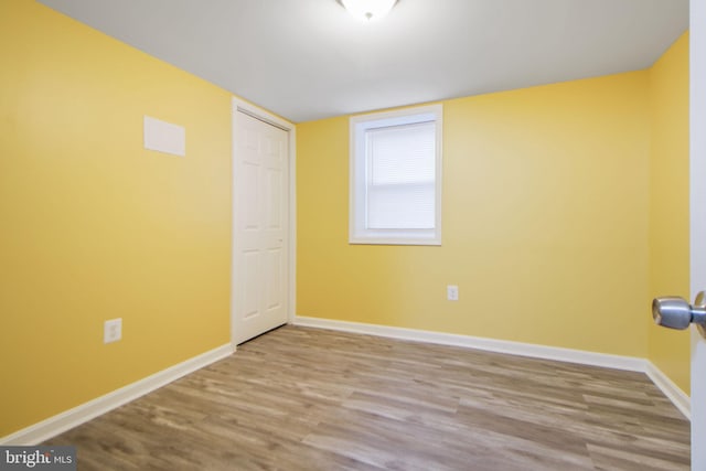 659 Charraway Rd, Baltimore, MD 21229 - empty room featuring baseboards and wood finished floors