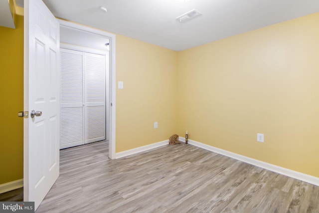 659 Charraway Rd, Baltimore, MD 21229 - spare room with light wood-style floors and baseboards