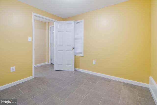 659 Charraway Rd, Baltimore, MD 21229 - unfurnished room featuring baseboards