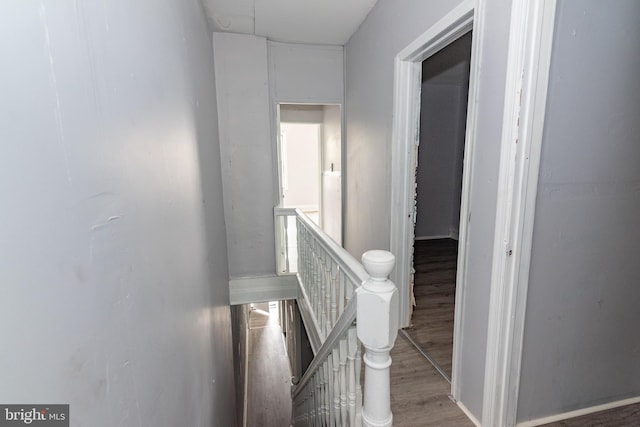 1826 E 28th St, Baltimore, MD 21218 - hallway with an upstairs landing and light wood finished floors