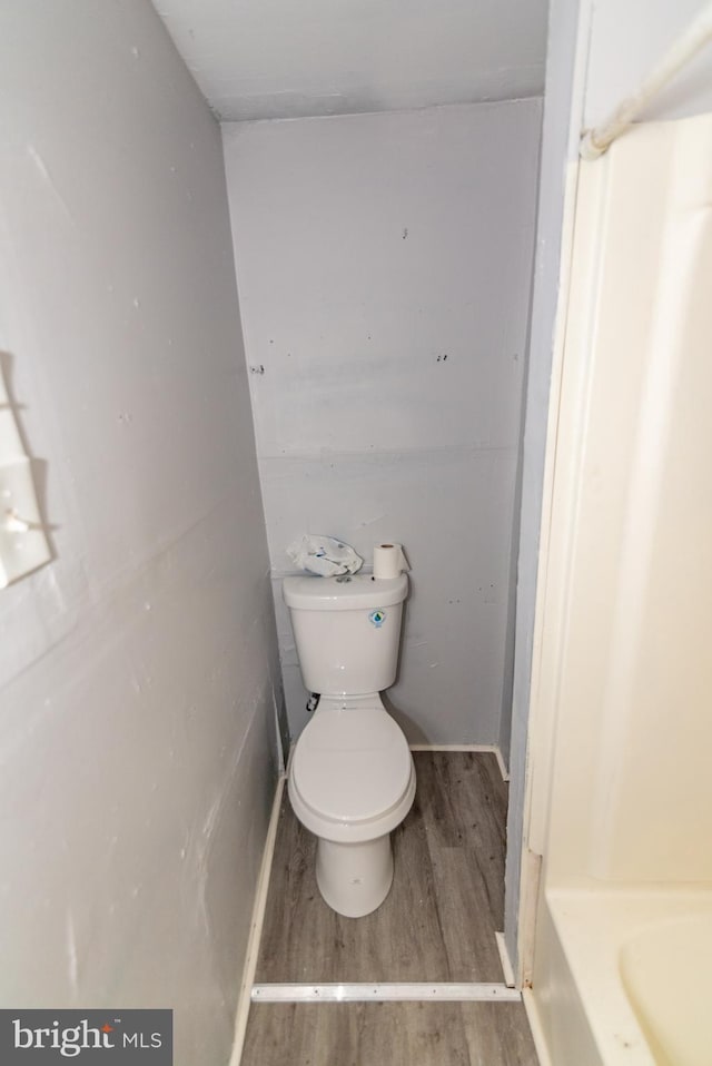 1826 E 28th St, Baltimore, MD 21218 - bathroom with toilet and wood finished floors