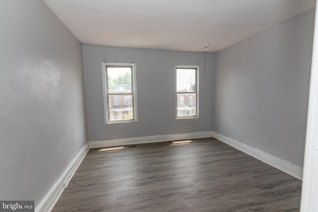 1826 E 28th St, Baltimore, MD 21218 - unfurnished room with baseboards and wood finished floors