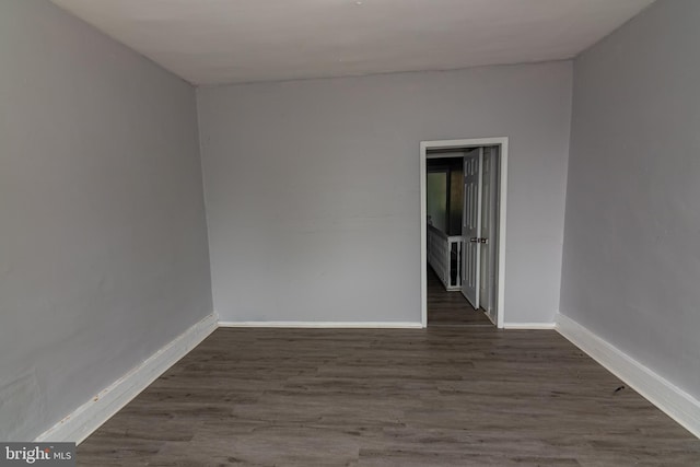 1826 E 28th St, Baltimore, MD 21218 - empty room featuring wood finished floors