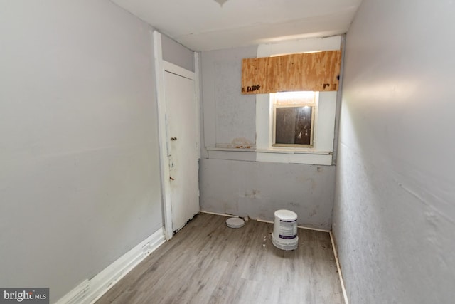 1826 E 28th St, Baltimore, MD 21218 - unfurnished room featuring light wood-style floors