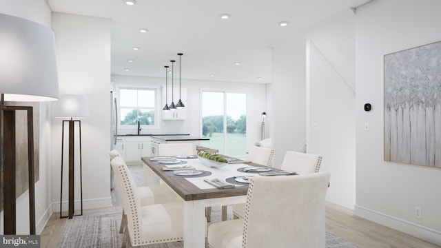 42127 Picasso Sq, Ashburn, VA 20148 - dining space with light wood-style floors, recessed lighting, and a water view