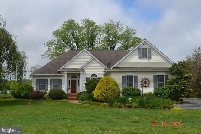 8698 Cummings Rd, Wittman, MD 21676 - view of front facade with a front lawn, a chimney, and a shingled roof