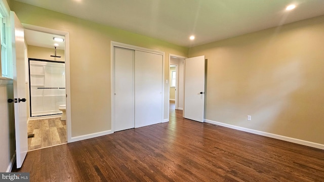 1440 N 26th St, Allentown, PA 18104 - unfurnished bedroom with dark wood finished floors, ensuite bathroom, recessed lighting, and a closet