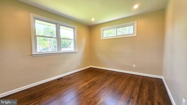 1440 N 26th St, Allentown, PA 18104 - empty room featuring dark wood-style flooring and recessed lighting