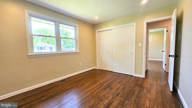 1440 N 26th St, Allentown, PA 18104 - unfurnished bedroom with dark wood-type flooring, a closet, and recessed lighting