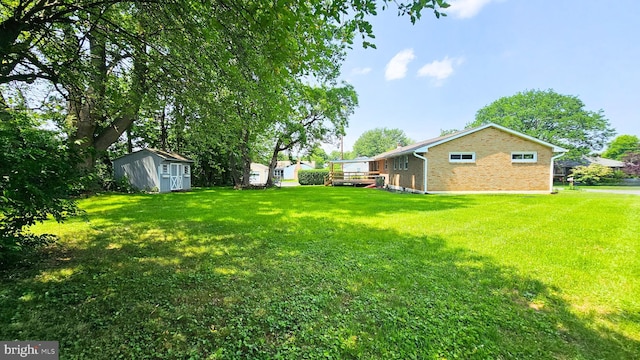 1440 N 26th St, Allentown, PA 18104 - view of grassy yard featuring a storage unit