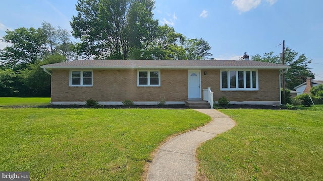 1440 N 26th St, Allentown, PA 18104 - single story home featuring brick siding, a front yard, and a chimney