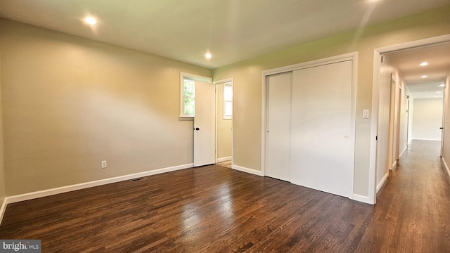 1440 N 26th St, Allentown, PA 18104 - unfurnished bedroom featuring dark wood-type flooring, a closet, and recessed lighting