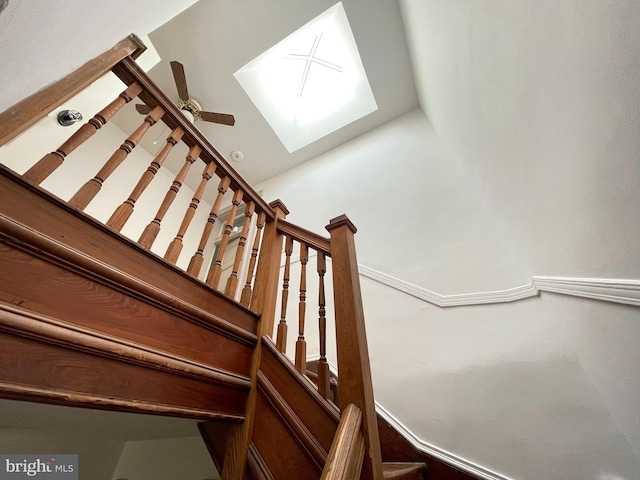 2741 N Calvert St, Baltimore, MD 21218 - staircase with ceiling fan