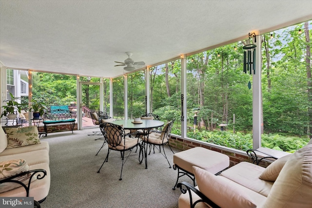 207 Saddle Dr, Furlong, PA 18925 - sunroom featuring a ceiling fan, outdoor dining space, and view of wooded area