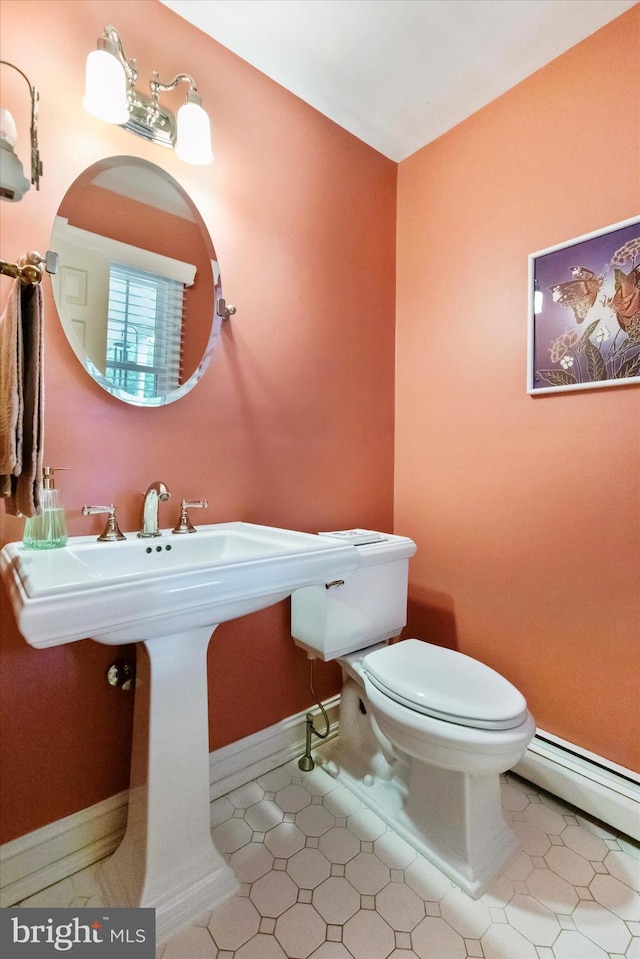 207 Saddle Dr, Furlong, PA 18925 - bathroom featuring toilet and baseboard heating