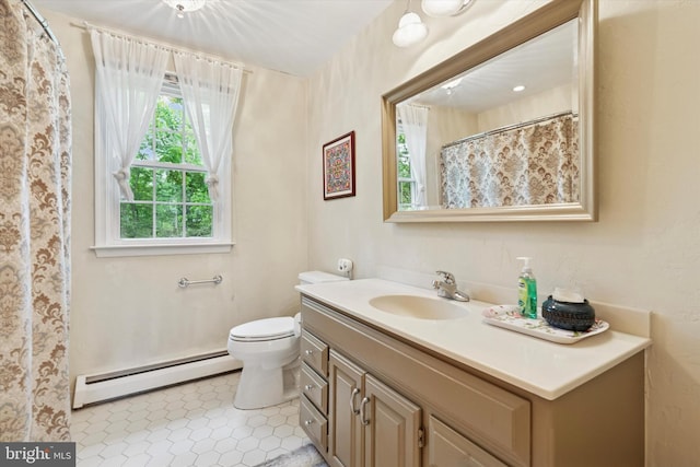 207 Saddle Dr, Furlong, PA 18925 - bathroom featuring baseboard heating, vanity, tile patterned floors, and curtained shower