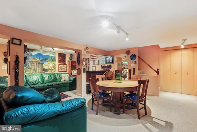 207 Saddle Dr, Furlong, PA 18925 - dining space featuring rail lighting, light colored carpet, and bar area