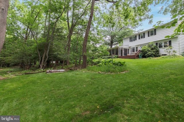 207 Saddle Dr, Furlong, PA 18925 - view of green lawn with a sunroom