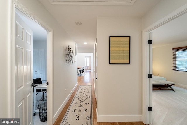 7913 Double Creek Ct, Springfield, VA 22153 - corridor with baseboards and wood finished floors