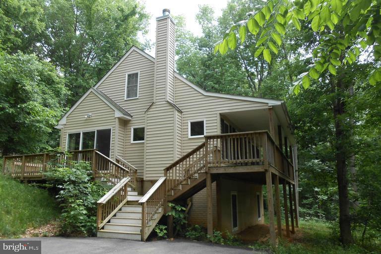 175 Easy Hollow Rd, Front Royal, VA 22630 - back of house with a deck, stairs, and a chimney