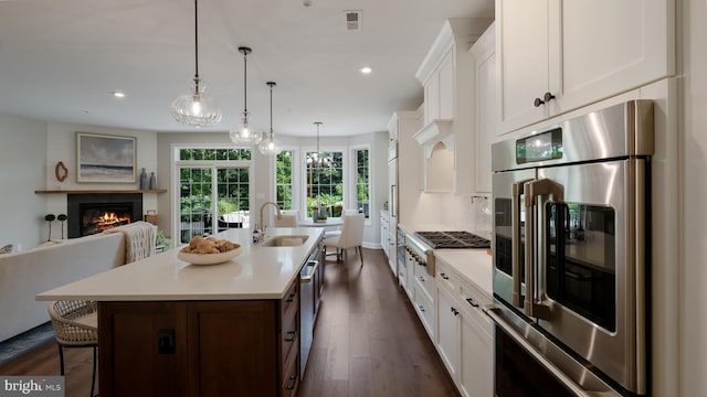274 W Ashland St, Doylestown, PA 18901 - kitchen with open floor plan, light countertops, recessed lighting, white cabinets, and dark wood-type flooring
