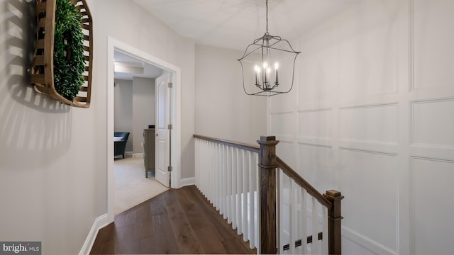 274 W Ashland St, Doylestown, PA 18901 - hallway featuring an upstairs landing, a chandelier, and dark wood-style floors