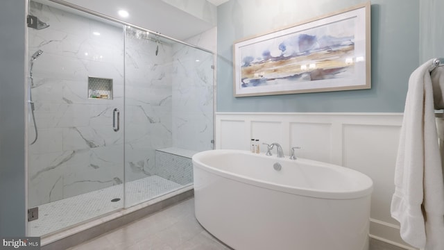 274 W Ashland St, Doylestown, PA 18901 - full bath featuring a freestanding bath, a decorative wall, a marble finish shower, and wainscoting