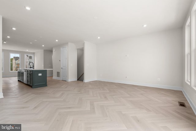 23079 Copper Tree Ter, Ashburn, VA 20148 - unfurnished living room with baseboards and recessed lighting