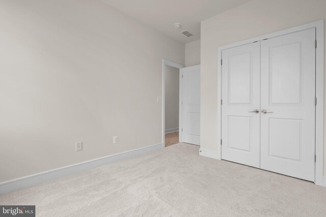 23079 Copper Tree Ter, Ashburn, VA 20148 - unfurnished bedroom featuring carpet and a closet