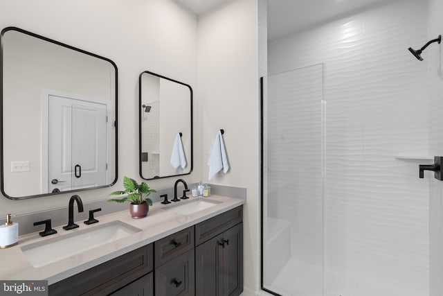 23079 Copper Tree Ter, Ashburn, VA 20148 - bathroom featuring double vanity and a shower stall