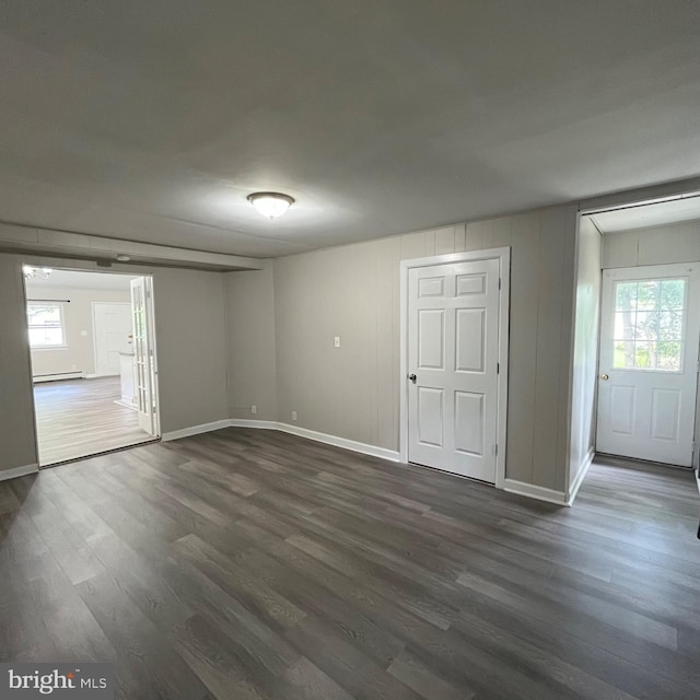 14 Akwaala Trl, Browns Mills, NJ 08015 - empty room featuring dark wood finished floors, attic access, and baseboard heating