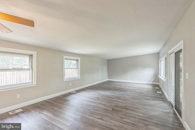 511 Sylvan Way, Pasadena, MD 21122 - empty room with wood finished floors and baseboards