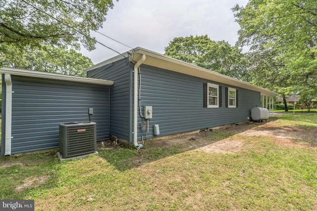 511 Sylvan Way, Pasadena, MD 21122 - view of side of home featuring a yard and heating fuel