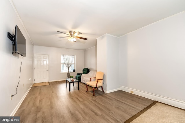 442 Crescent St, Harrisburg, PA 17104 - sitting room with ceiling fan, light wood-style floors, and crown molding