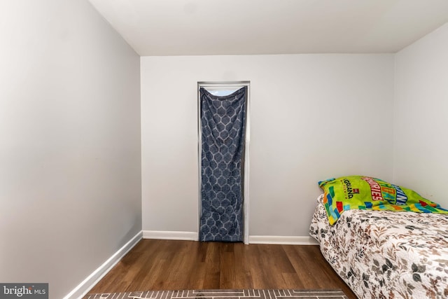 442 Crescent St, Harrisburg, PA 17104 - bedroom featuring dark wood-type flooring and baseboards
