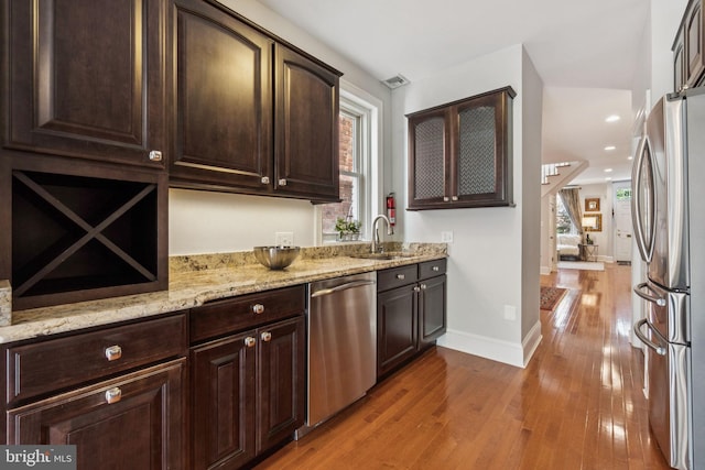 425 16th St SE, Washington, DC 20003 - bar area with stainless steel appliances, light wood-type flooring, and recessed lighting