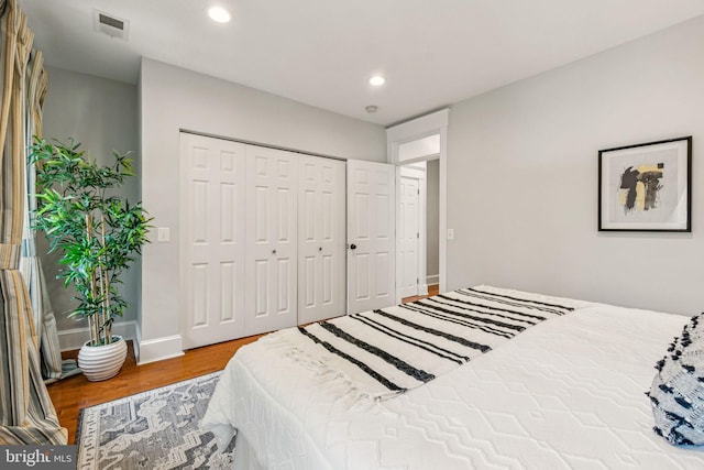 425 16th St SE, Washington, DC 20003 - bedroom with wood finished floors, a closet, and recessed lighting