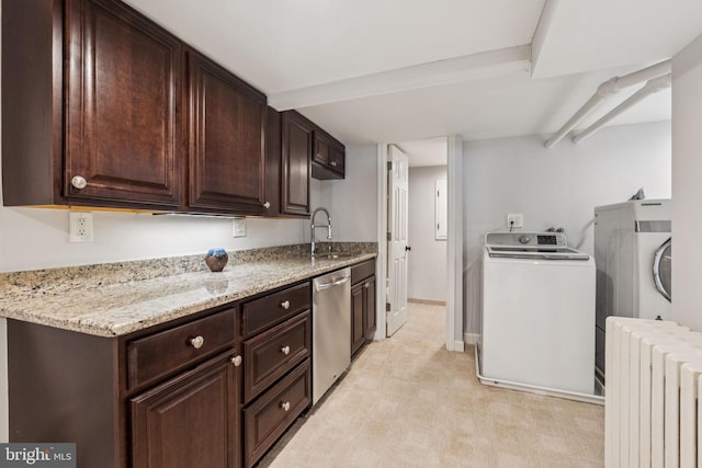 425 16th St SE, Washington, DC 20003 - kitchen featuring radiator heating unit, stainless steel dishwasher, dark brown cabinets, and light stone counters