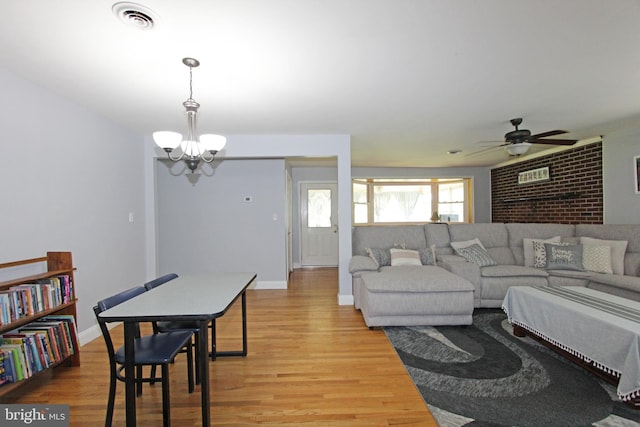 311 Norman Dr, Newark, DE 19702 - living area with light wood-style floors, a chandelier, and ceiling fan