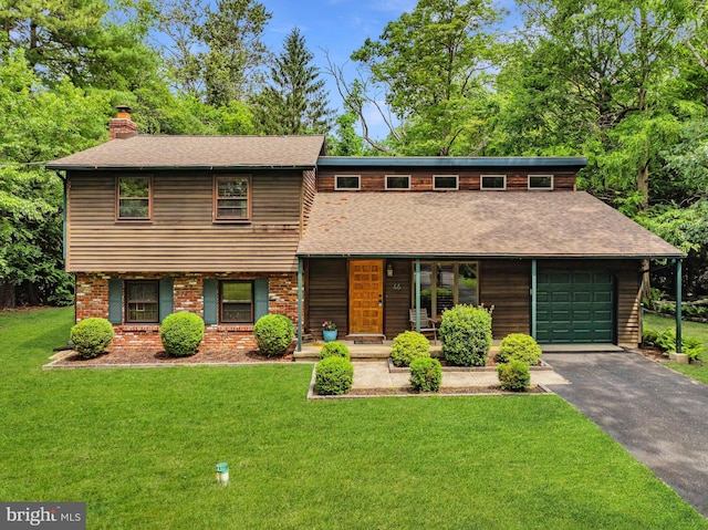 46 Grassy Lake Rd, Shamong, NJ 08088 - view of front facade featuring a chimney, a front lawn, a porch, driveway, and roof with shingles