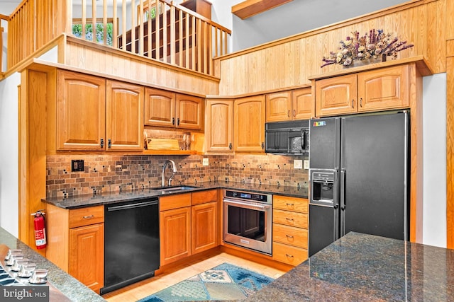 46 Grassy Lake Rd, Shamong, NJ 08088 - kitchen featuring black appliances, dark stone countertops, backsplash, and light wood-style flooring
