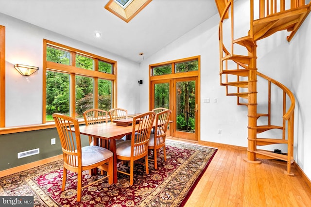 46 Grassy Lake Rd, Shamong, NJ 08088 - dining space with stairs, healthy amount of natural light, lofted ceiling, a skylight, and wood-type flooring