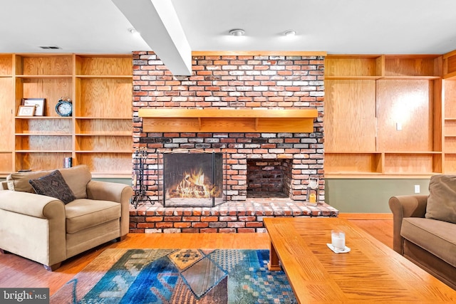 46 Grassy Lake Rd, Shamong, NJ 08088 - living area featuring a fireplace, wood finished floors, and wood walls
