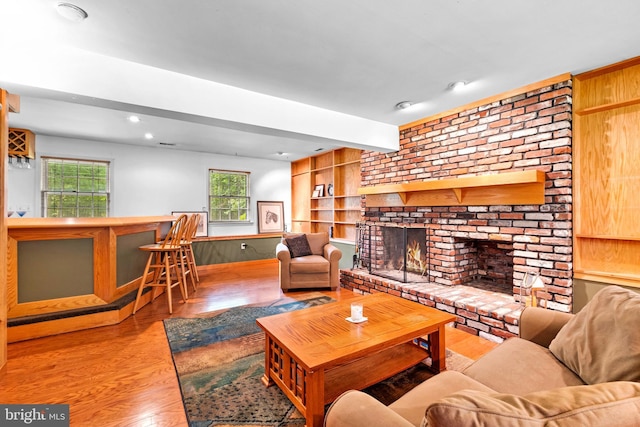 46 Grassy Lake Rd, Shamong, NJ 08088 - living room with wood finished floors, a fireplace, built in features, recessed lighting, and a dry bar