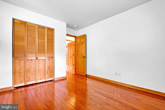 46 Grassy Lake Rd, Shamong, NJ 08088 - unfurnished bedroom with hardwood / wood-style floors and a closet