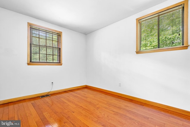 46 Grassy Lake Rd, Shamong, NJ 08088 - empty room with healthy amount of natural light and wood-type flooring
