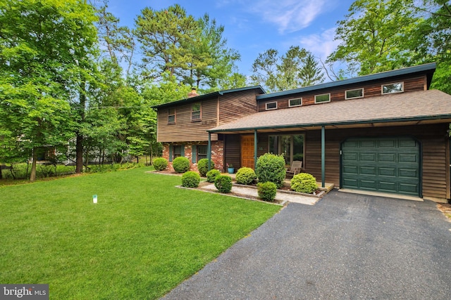 46 Grassy Lake Rd, Shamong, NJ 08088 - view of front of house featuring a garage, a chimney, a front lawn, asphalt driveway, and a porch