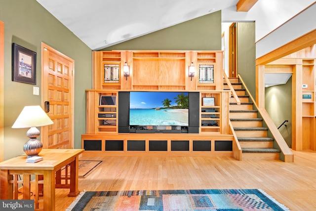 46 Grassy Lake Rd, Shamong, NJ 08088 - living area featuring wood finished floors, vaulted ceiling, and stairs